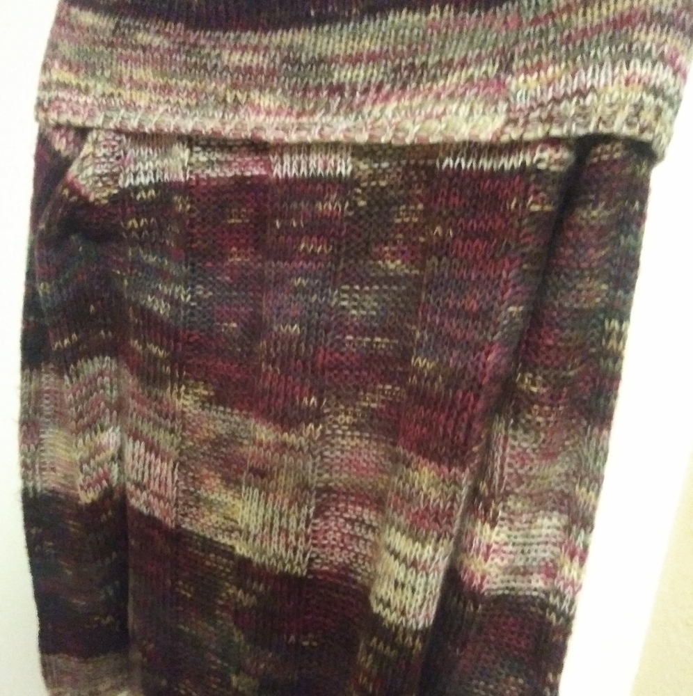 Multi colored, long sleeve sweater.
